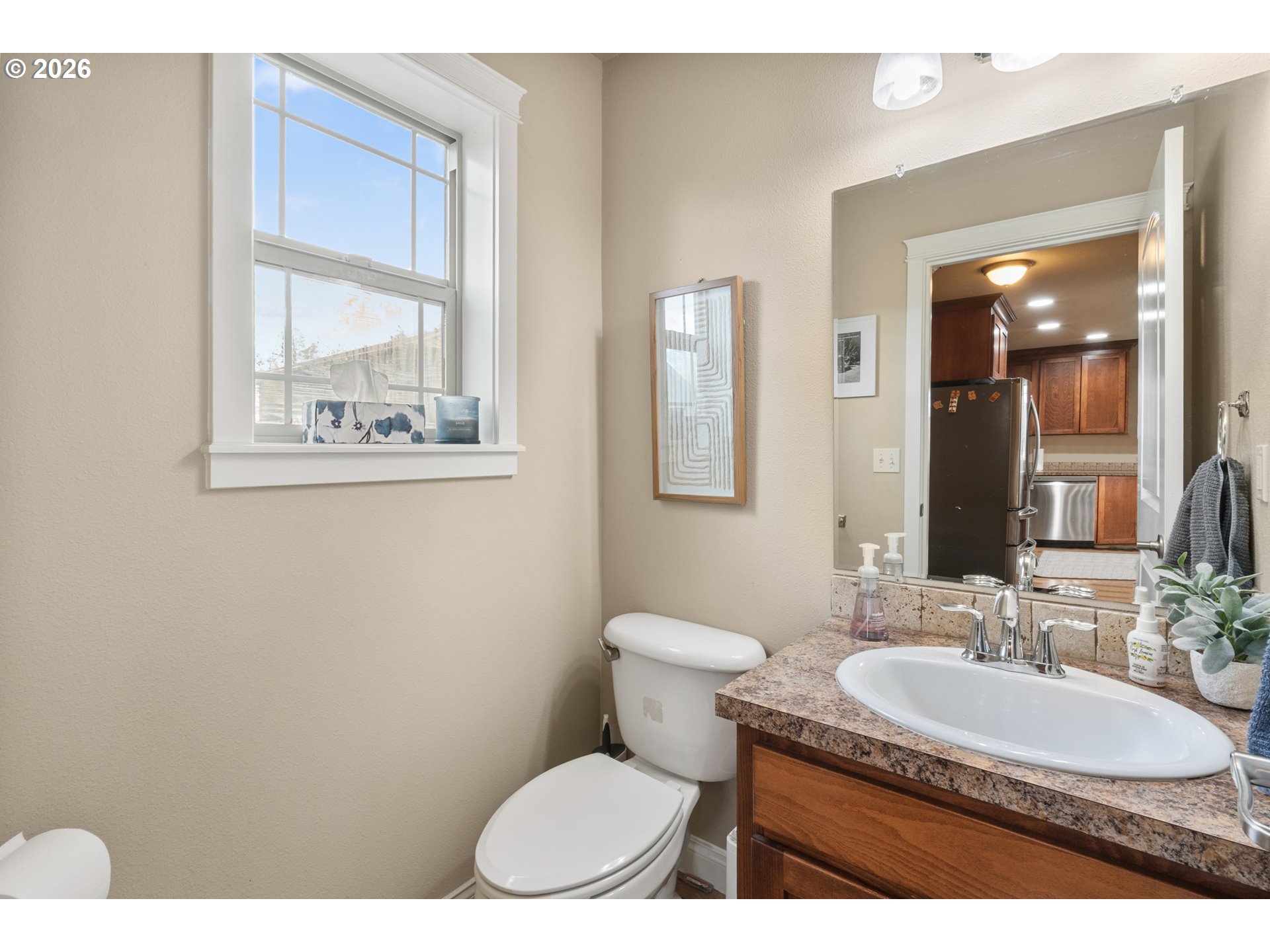 4971 Northeast Terri Lane Albany, OR 97321 - Photo 9 of 44 a bathroom with a sink toilet and a mirror