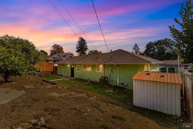 a house view with a garden space