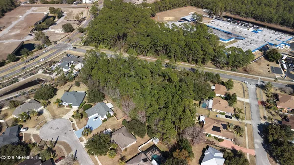 an aerial view of a city with lots of residential buildings