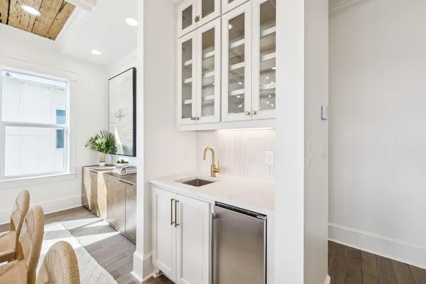 a bedroom with a bed and a television