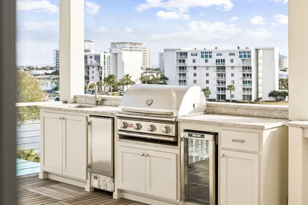 a view of a balcony with wooden floor