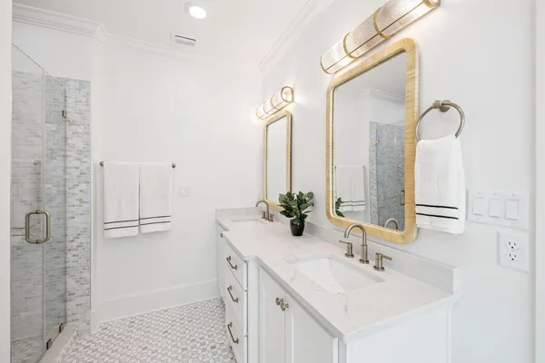 a front view of a building with a garden