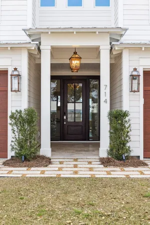 a living room with furniture fireplace and a flat screen tv