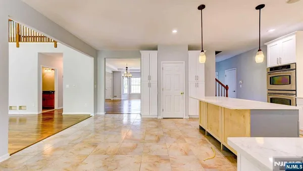 a view of a kitchen center island cabinets and a wooden floor