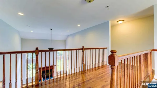 a view of a hallway with a living room