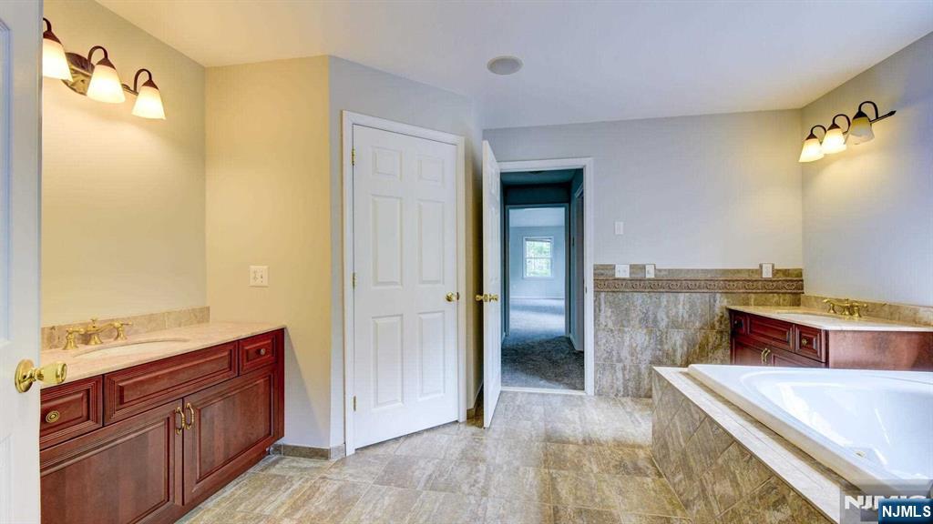 15 Berry Court Flanders, NJ 07836 - Photo 39 of 48 a room with a bed and a view of bathroom