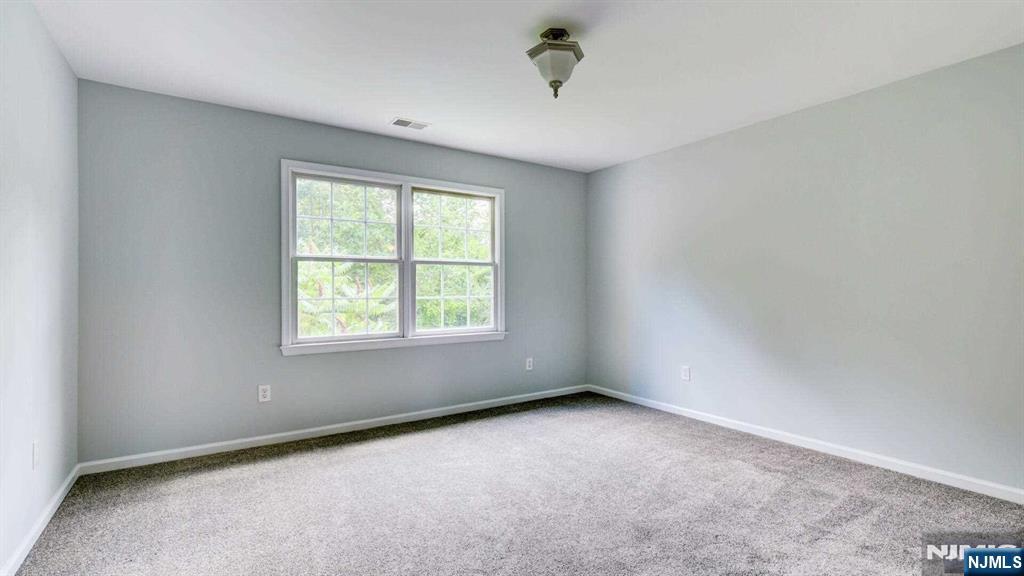 15 Berry Court Flanders, NJ 07836 - Photo 40 of 48 an empty room with a window