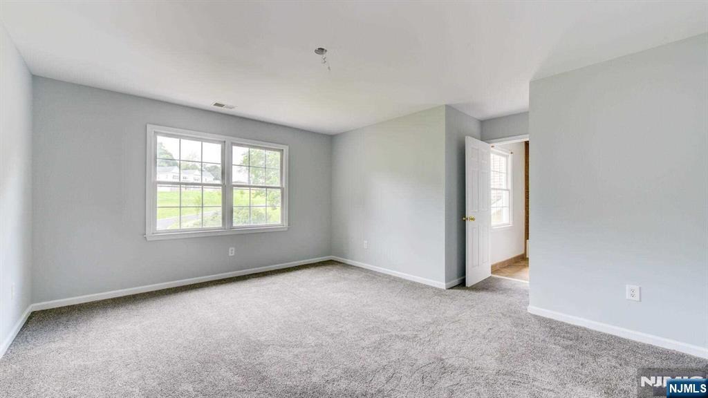 15 Berry Court Flanders, NJ 07836 - Photo 43 of 48 an empty room with windows