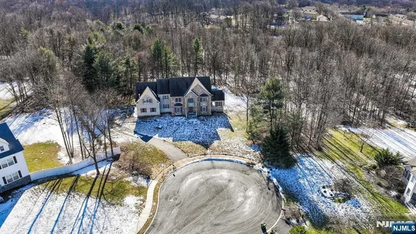 a view of swimming pool with seating space