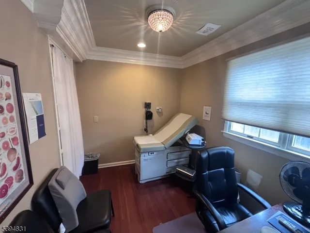 a view of a balcony with wooden floor