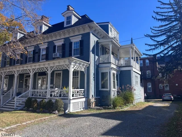 a view of a house with a street