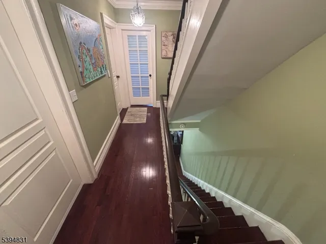 a view of a big house with a big yard