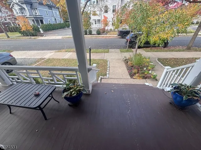 a view of living room with furniture and a window