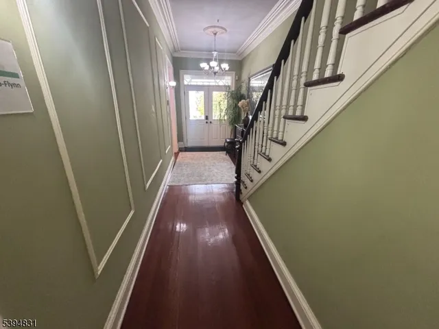 a kitchen with a refrigerator and a sink