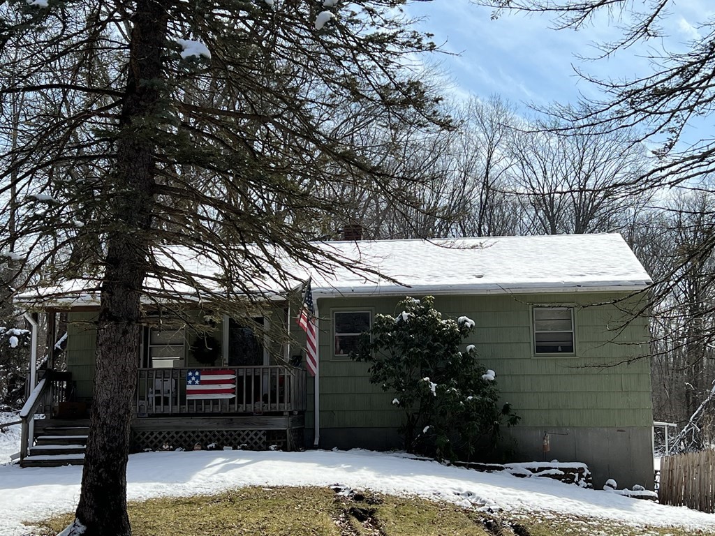 335-337 Maynard Road Wilbraham, MA 01095 - Photo 1 of 2 a view of a house with a patio