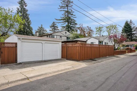 an empty room with a empty space and windows