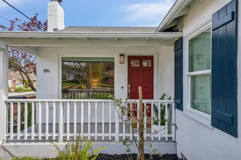 a front view of a house with a porch