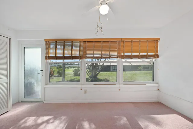 an empty room with window