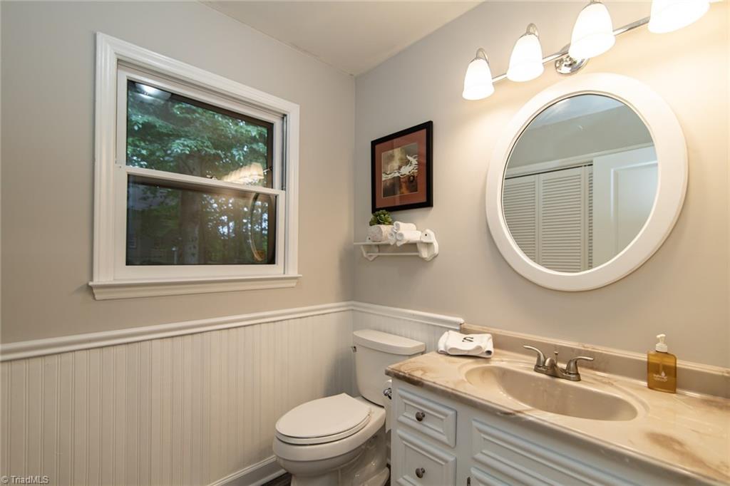 8220 Styers Ferry Road Clemmons, NC 27012 - Photo 14 of 30 Half bath & laundry on main floor
