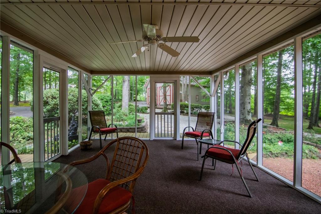 8220 Styers Ferry Road Clemmons, NC 27012 - Photo 8 of 30 A favorite spot on this screened-in porch