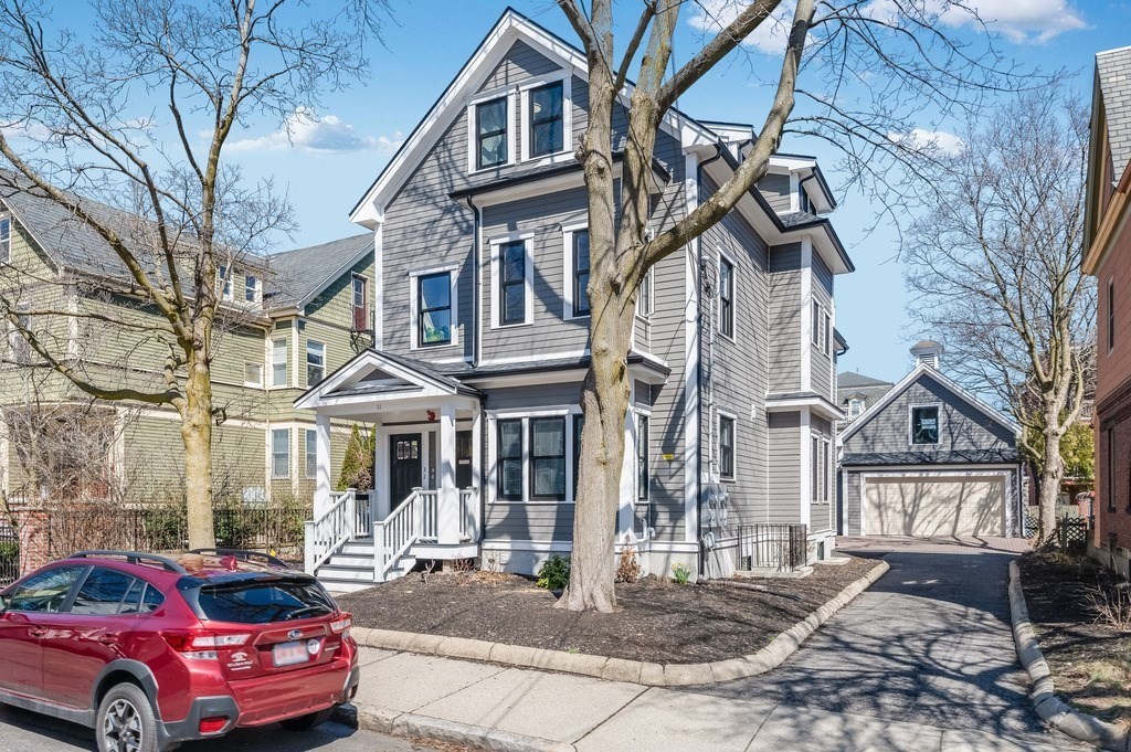 a front view of a house with parking space