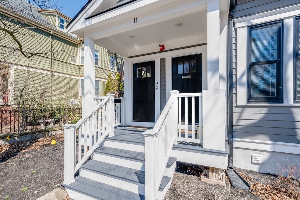 11 Preston Road, Unit 2 Somerville, MA 02143 - Photo 2 of 30 a view of a porch with wooden floor and stairs