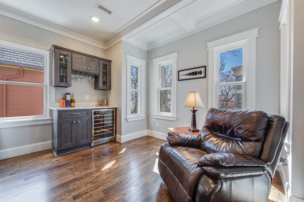 11 Preston Road, Unit 2 Somerville, MA 02143 - Photo 5 of 30 a living room with furniture and a wooden floor