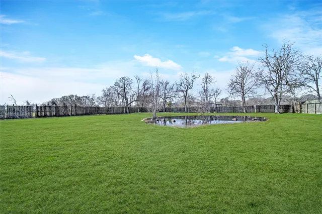 a view of a golf course with a lake