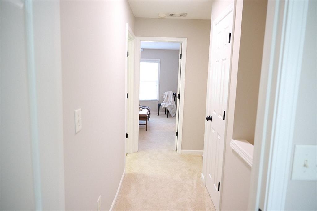 14183 Yacht Terrace Alpharetta, GA 30004 - Photo 18 of 30 a view of a bathroom with a sink and mirror