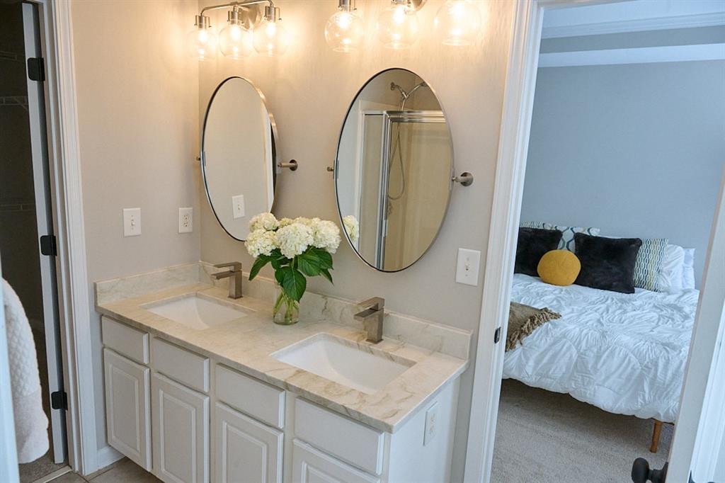 14183 Yacht Terrace Alpharetta, GA 30004 - Photo 20 of 30 a bathroom with a sink and a mirror