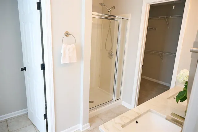 a white bath tub with a window