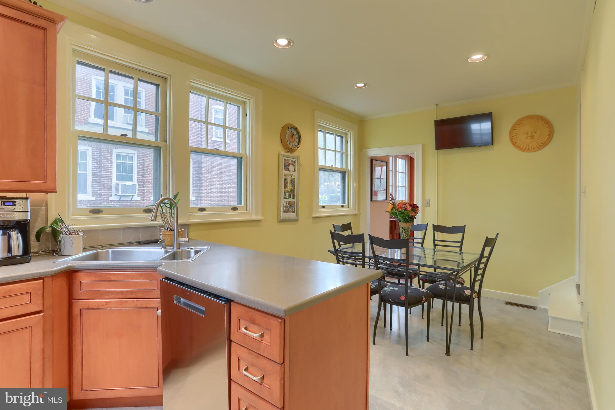 3 East High Street Lebanon, PA 17042 - Photo 15 of 55 a kitchen with a table chairs and a sink