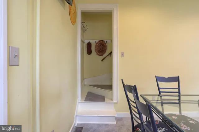 a kitchen with a refrigerator sink and stove top oven
