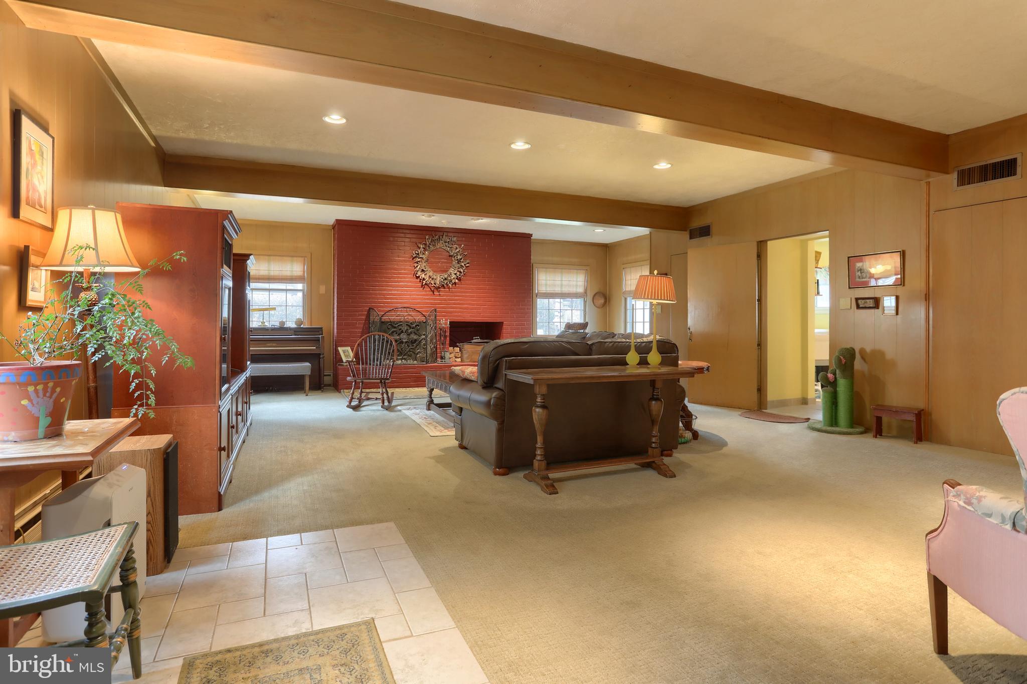 3 East High Street Lebanon, PA 17042 - Photo 22 of 55 a living room with furniture and a flat screen tv