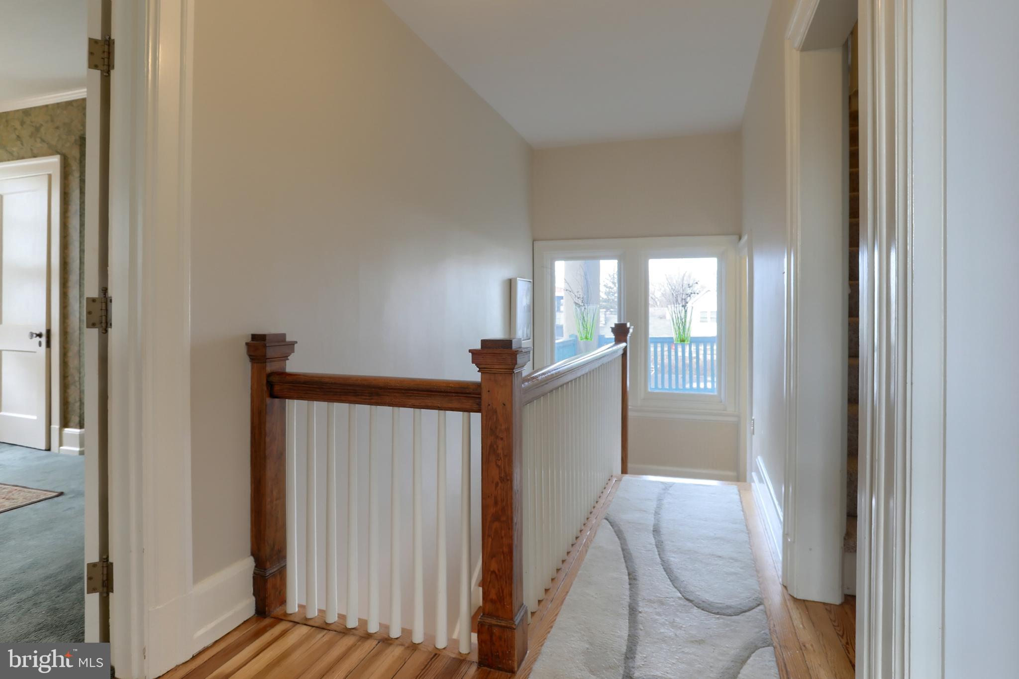 3 East High Street Lebanon, PA 17042 - Photo 29 of 55 a view of a hallway with wooden floor and stairs