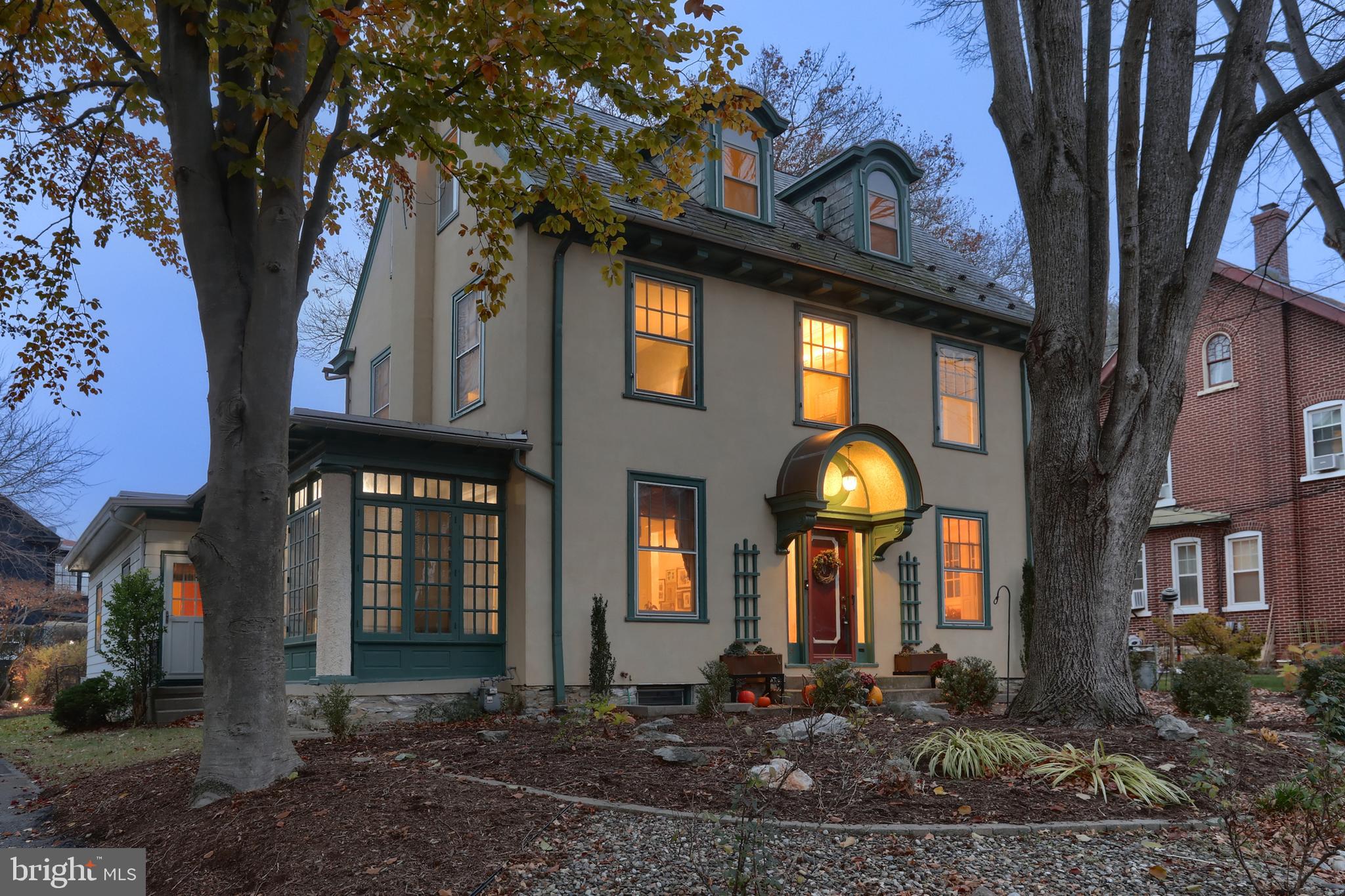 3 East High Street Lebanon, PA 17042 - Photo 4 of 55 a front view of a house with lots of trees