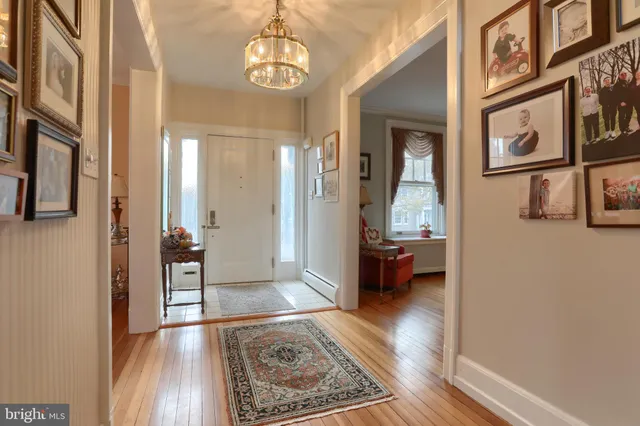 a view of entryway with wooden floor