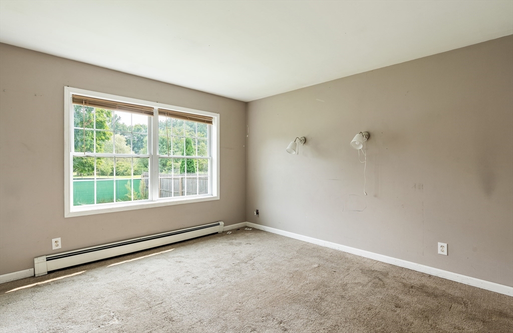3 Meadow Lane Orange, MA 01364 - Photo 15 of 40 an empty room with a empty space and a window