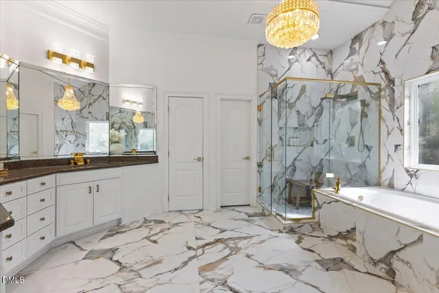a bathroom with double vanity sink and a mirror