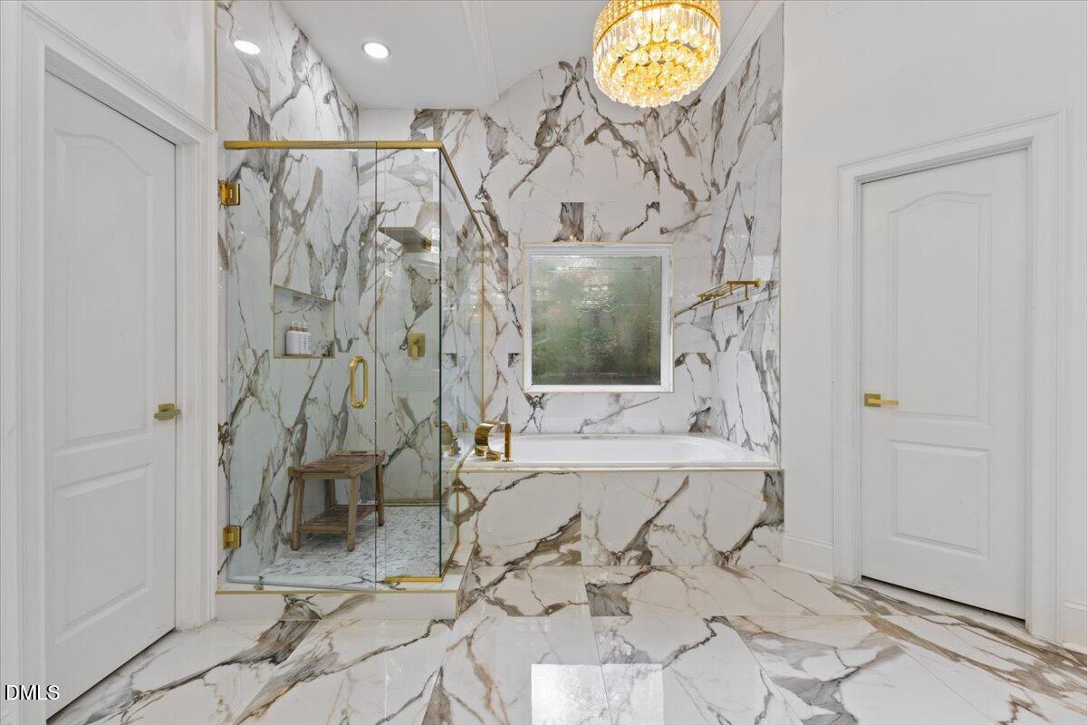 32 Woodgate Court Durham, NC 27713 - Photo 13 of 47 a bath room with a bath tub and shower