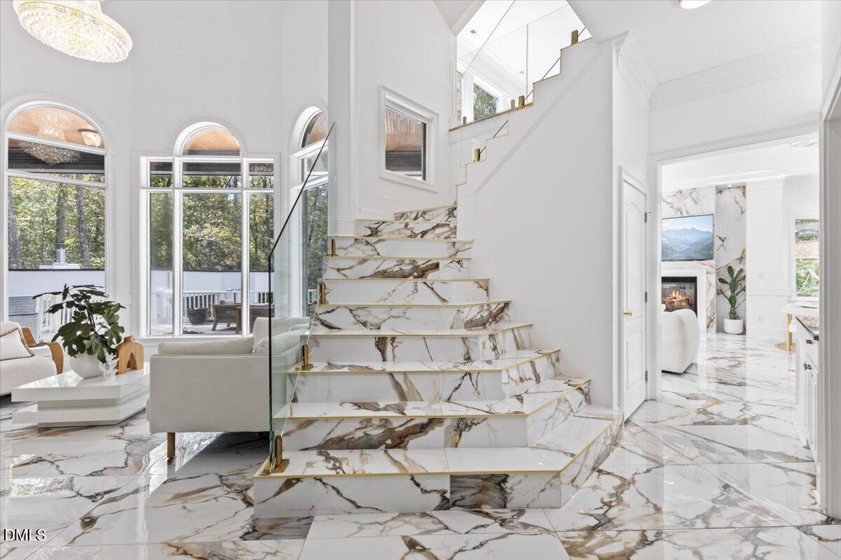 32 Woodgate Court Durham, NC 27713 - Photo 22 of 47 a view of a living room and a floor to ceiling window