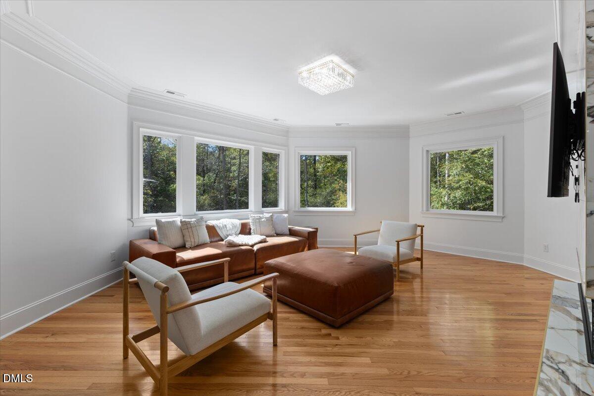32 Woodgate Court Durham, NC 27713 - Photo 24 of 47 a living room with furniture and a window