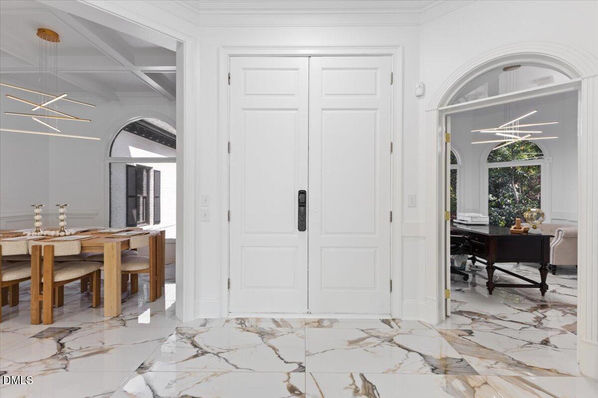 32 Woodgate Court Durham, NC 27713 - Photo 4 of 47 a view of a hallway with seating area