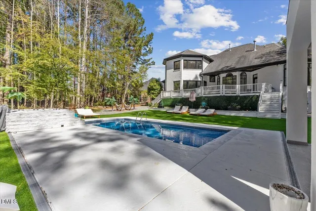 a view of outdoor space yard and swimming pool