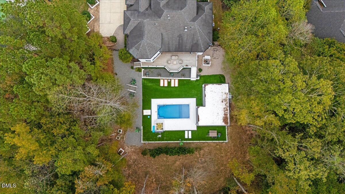 32 Woodgate Court Durham, NC 27713 - Photo 47 of 47 a sign that is sitting on a brick wall