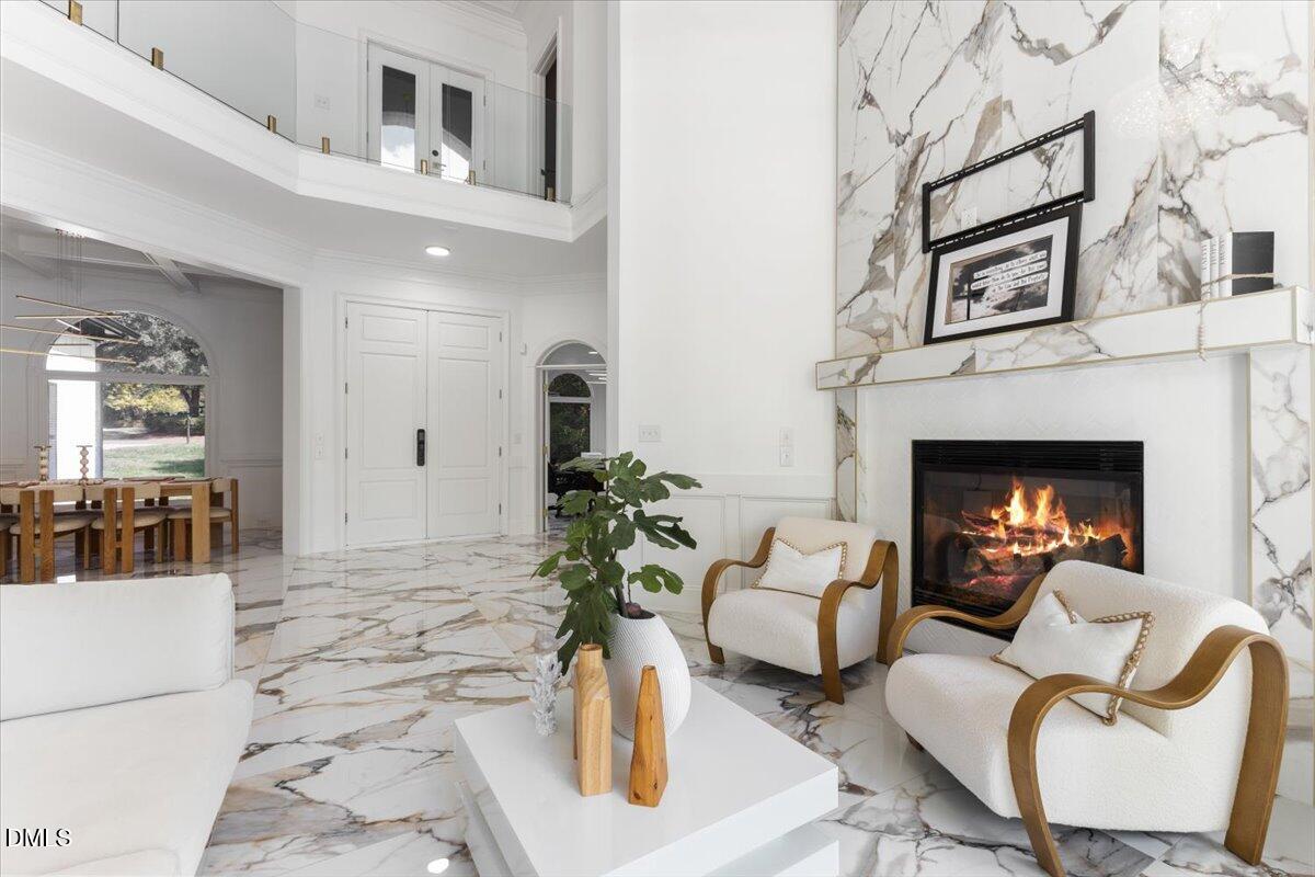 32 Woodgate Court Durham, NC 27713 - Photo 8 of 47 a living room with furniture and a fireplace