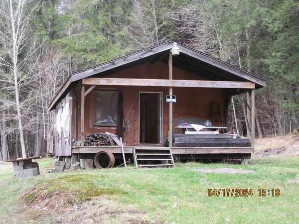 a view of a road with a trees