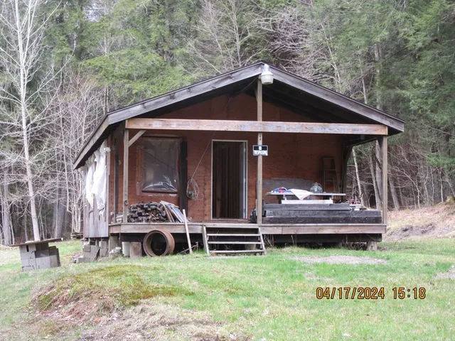 a view of a road with a trees