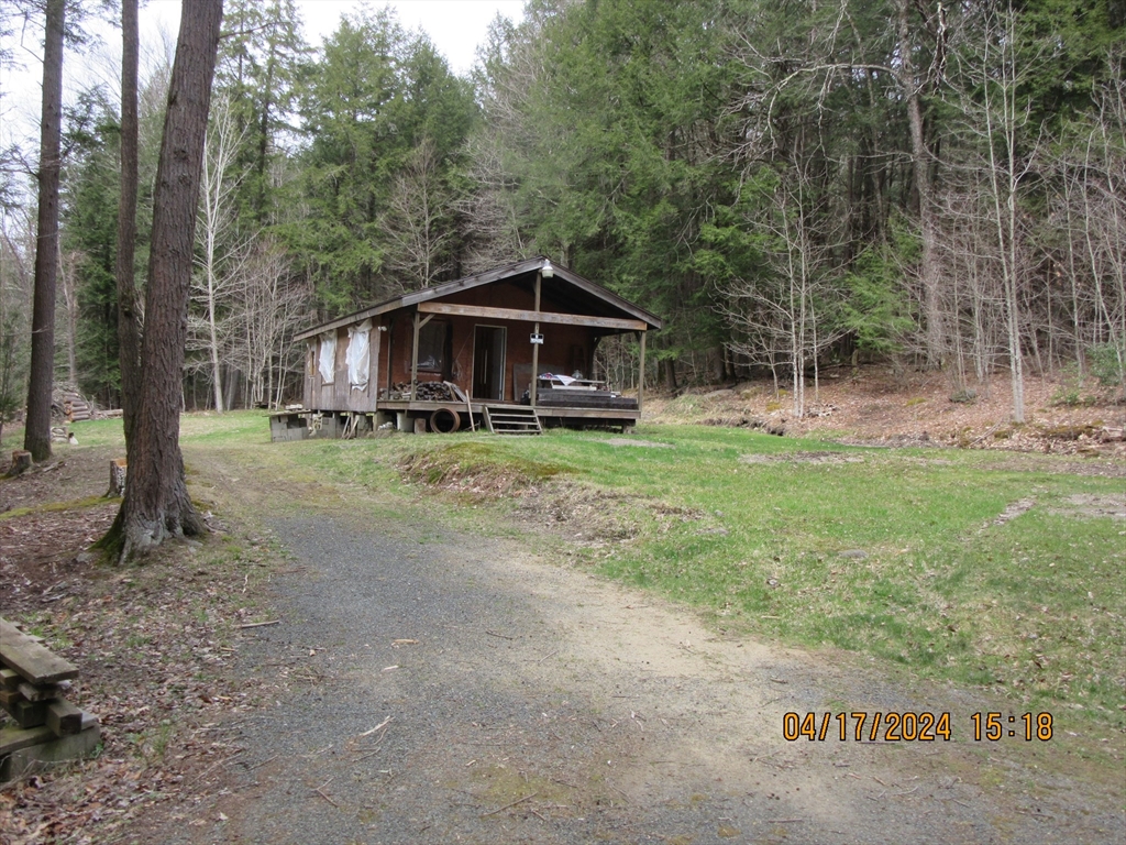 86 Ashfield Road Williamsburg, MA 01096 - Photo 17 of 20 a view of a house with a yard