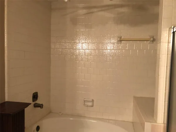 a bathroom with a bathtub